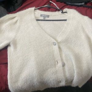 fuzzy, white cardigan